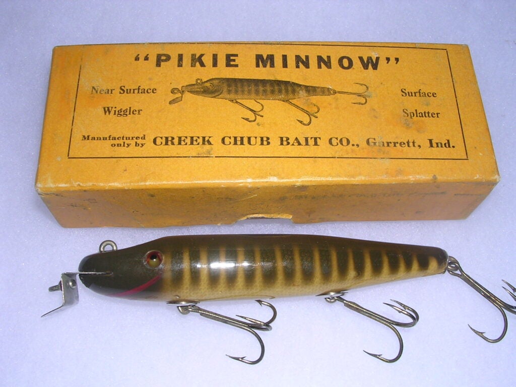 Vintage Lures - 'Baby Injured Minnow' by Creek Chub Bait Co.  Get the  history behind some of the most iconic fishing lures out there and discover  some unexpected facts about your
