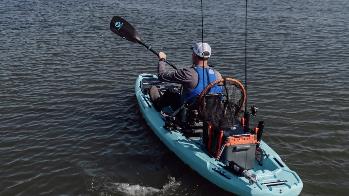 Angler paddling Wilderness Systems fishing kayak