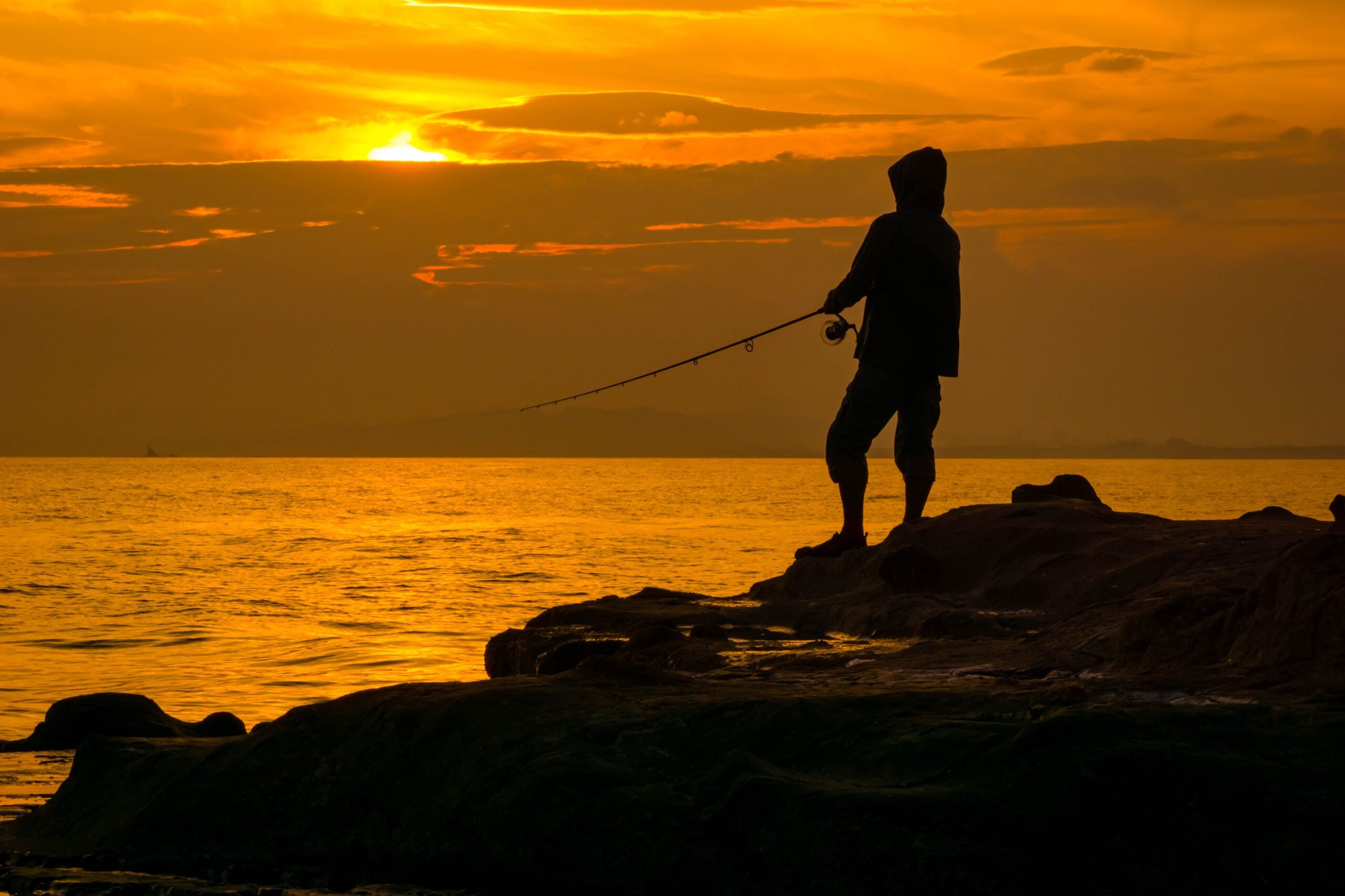 Fisherman Sunset catching a fish, & view beneath the water T-Shirt