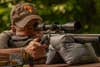 A shooter test fires the new Sauer 505 bolt-action rifle from a bench rest.