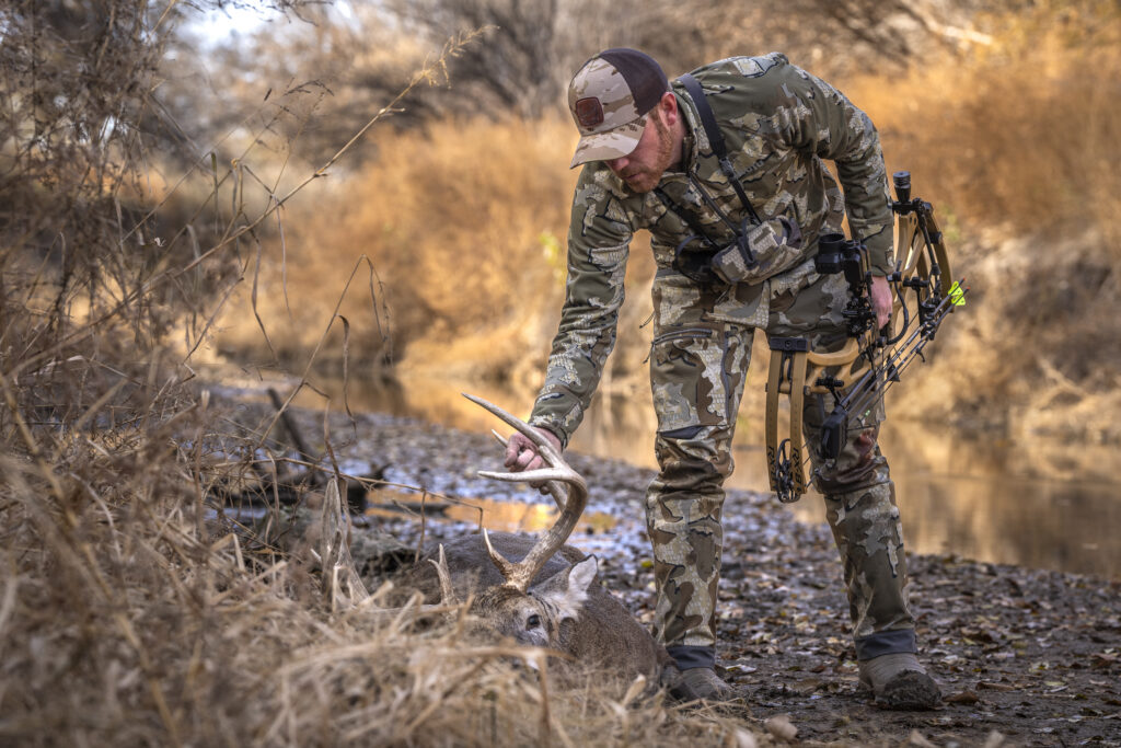 How to Field Dress a Deer, Step by Step A bowhunter recovers a nice whitetail buck near a creek