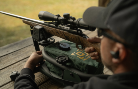 Man shooting rifle on Caldwell Lead Sled