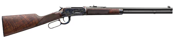 Winchester lever-action rifle with walnut stock and blued steel barrel on white background