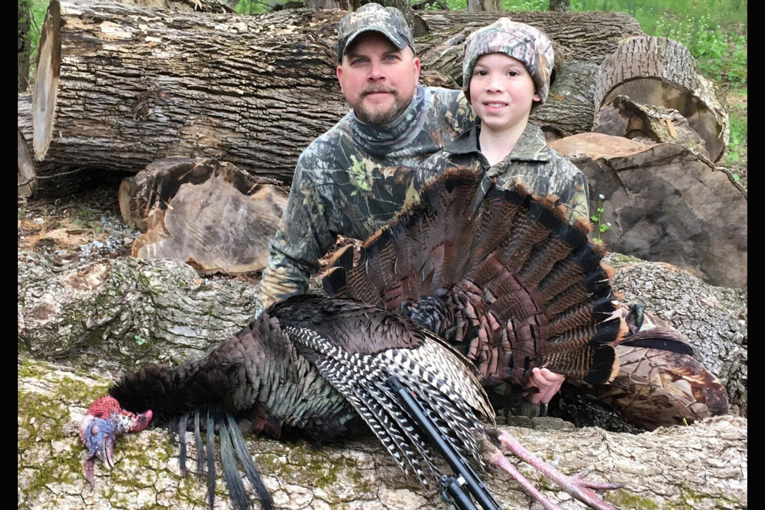 A 22.5-Inch Beard. 13 Beards Total. And 4 More Incredible Wild Turkey Records Tyler Blake Mumpower and his dad with turkey with 13 beards.