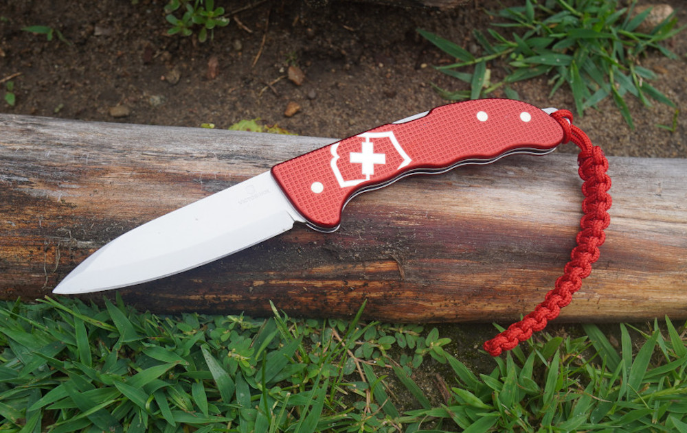 Victorinox Hunter Pro Alox knife laying on grass