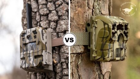 Two camouflage trail cameras mounted on trees in a side-by-side comparison.