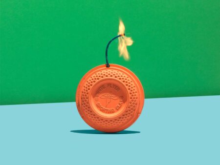 How to Make Exploding Targets White Flyer sporting clay pigeon target with lit fuse like a bomb