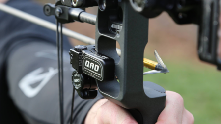 The 6 Best Arrow Rests of 2024, Tested and Reviewed Close-up of compound bow with QRD arrow rest and broadhead-tipped arrow nocked.