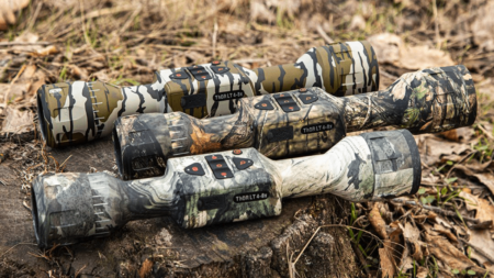The 6 Best Thermal Scopes for Hunting Three ATN ThOR LT 4-8x thermal rifle scopes in various camouflage patterns outdoors.