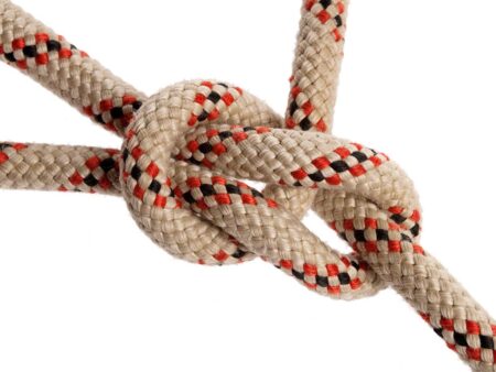 How to Tie a Knot: 12 Essential Outdoor Knots and Hitches Close-up of a square knot tied in a white and red braided rope