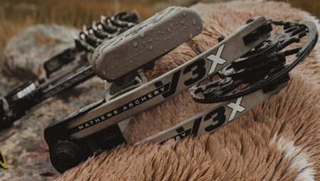 Compound Bow Review: Mathews V3X 29 Mathews Archery V3X compound bow with water droplets resting on animal fur