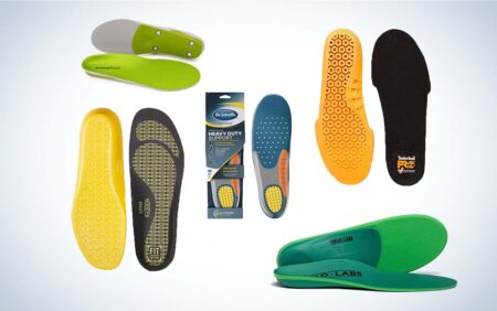 Collection of colorful shoe insoles including brands Dr. Scholls, Timberland, and Keen.