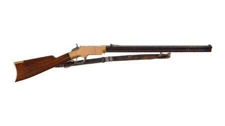 Antique Henry lever-action repeating rifle with brass receiver and wooden stock