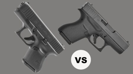 Two Glock compact pistols compared side by side on gray background