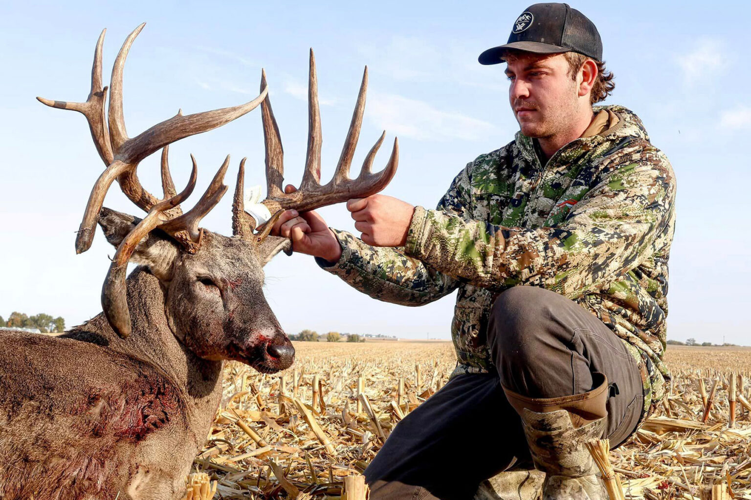 Hunter Arrows 216-Inch Iowa Whitetail After Year-Long Chase