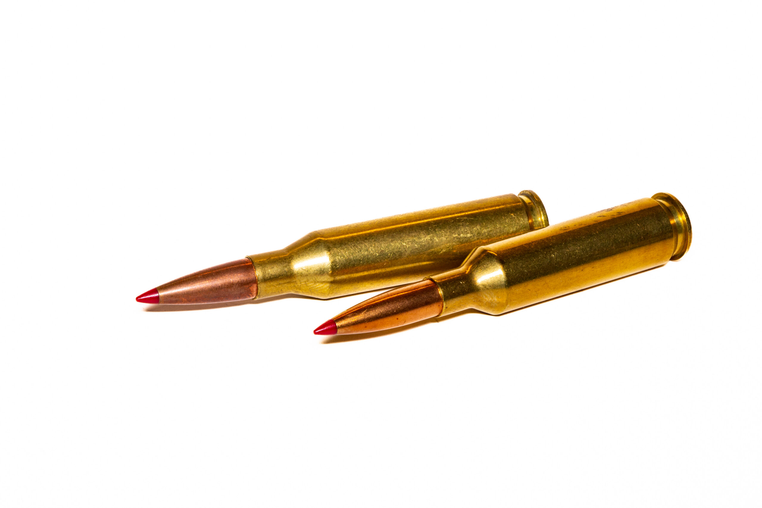 6.5 Creedmoor cartridge next to a 260 Remington.