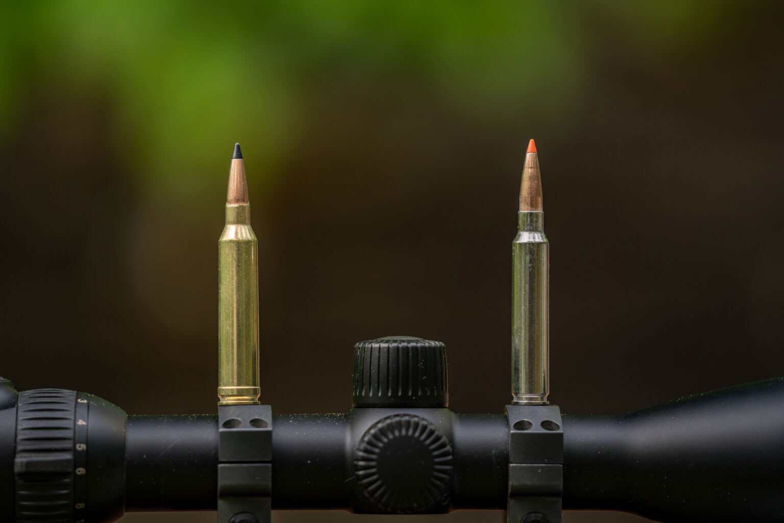 A side-by-side comparison of a 7mm Remington Magnum cartridge and 7mm Backcountry cartridge.