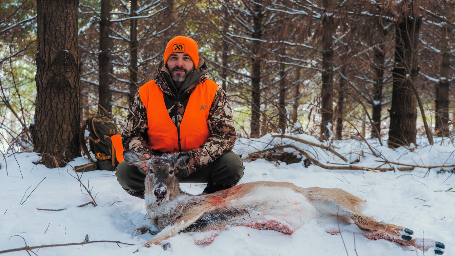 A hunter poses with a doe taken in during the Cazenova Doe Derby.