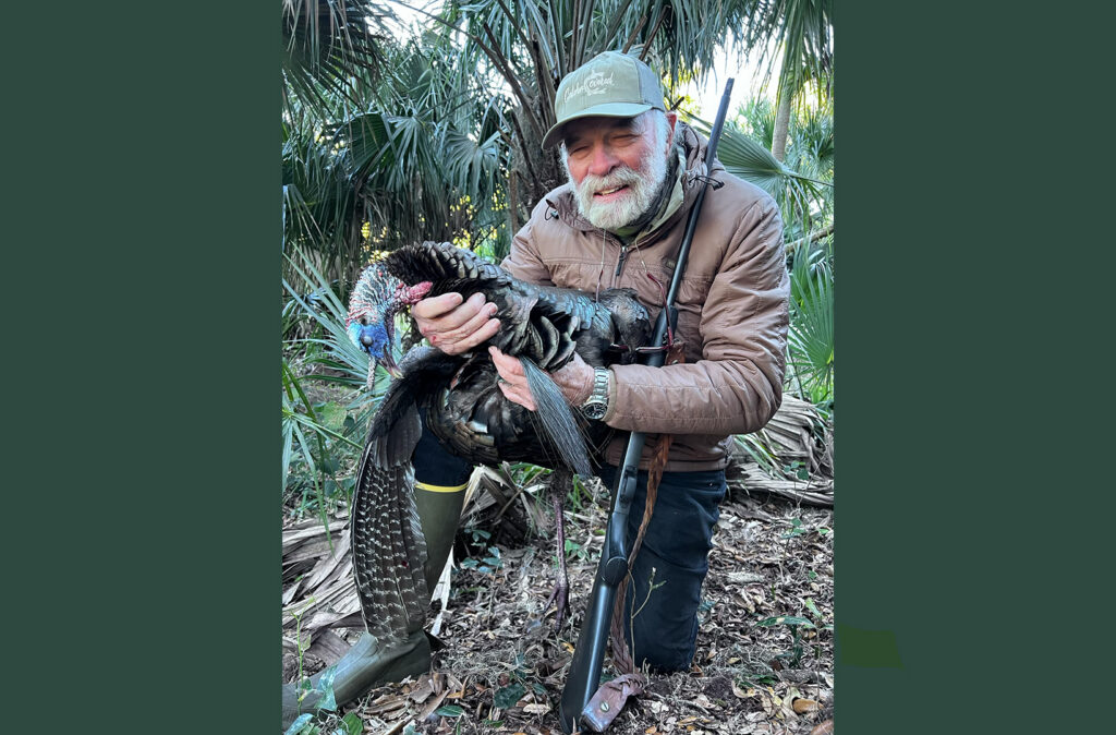 Flip Pallot holds a turkey