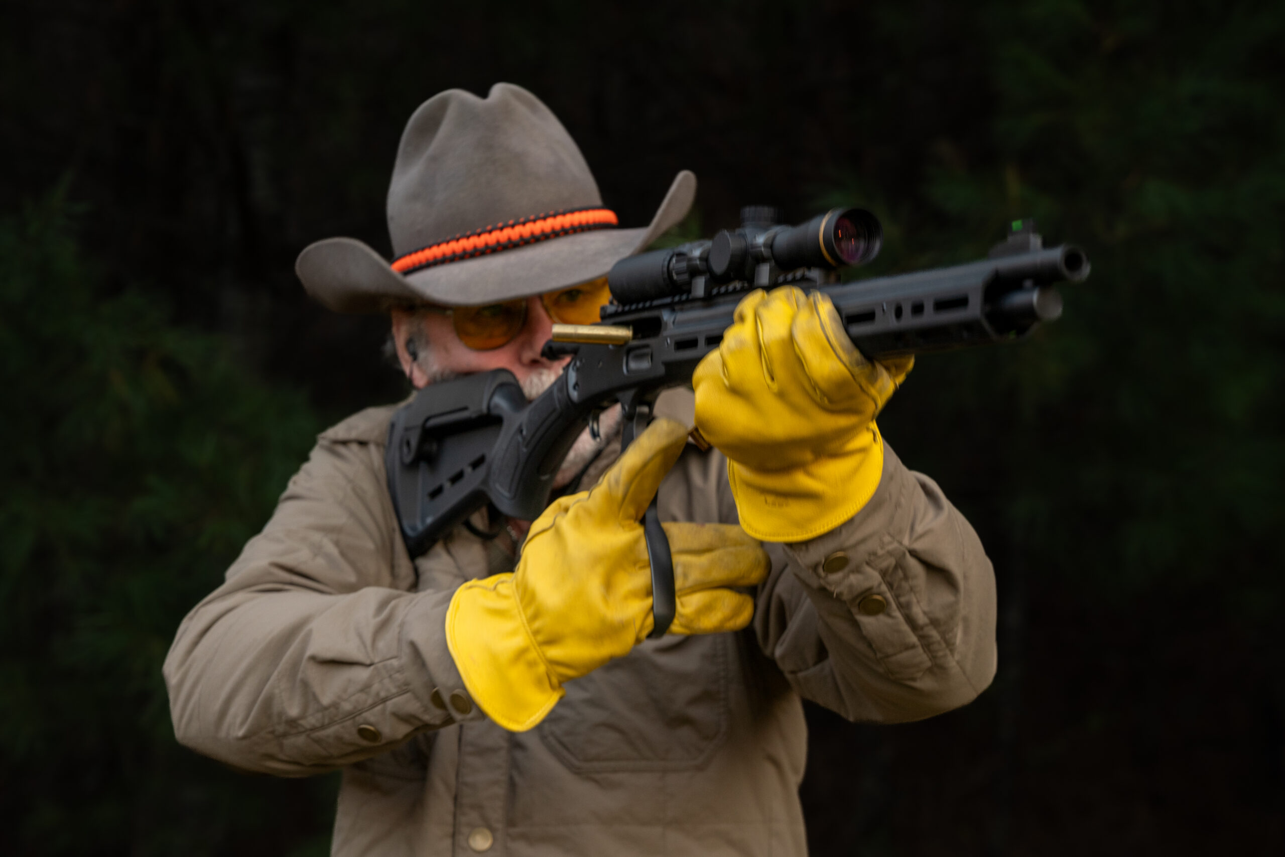 A shooter fires the Marlin 1985 Dark Series lever-action rifle. 