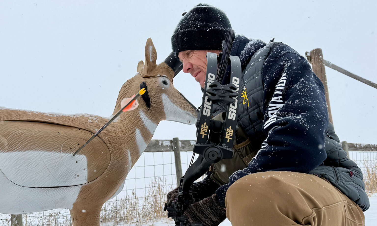 An archer admires a perfect shot on a 3D pronghorn target, fired with the new PSE Sicario compound bow.
