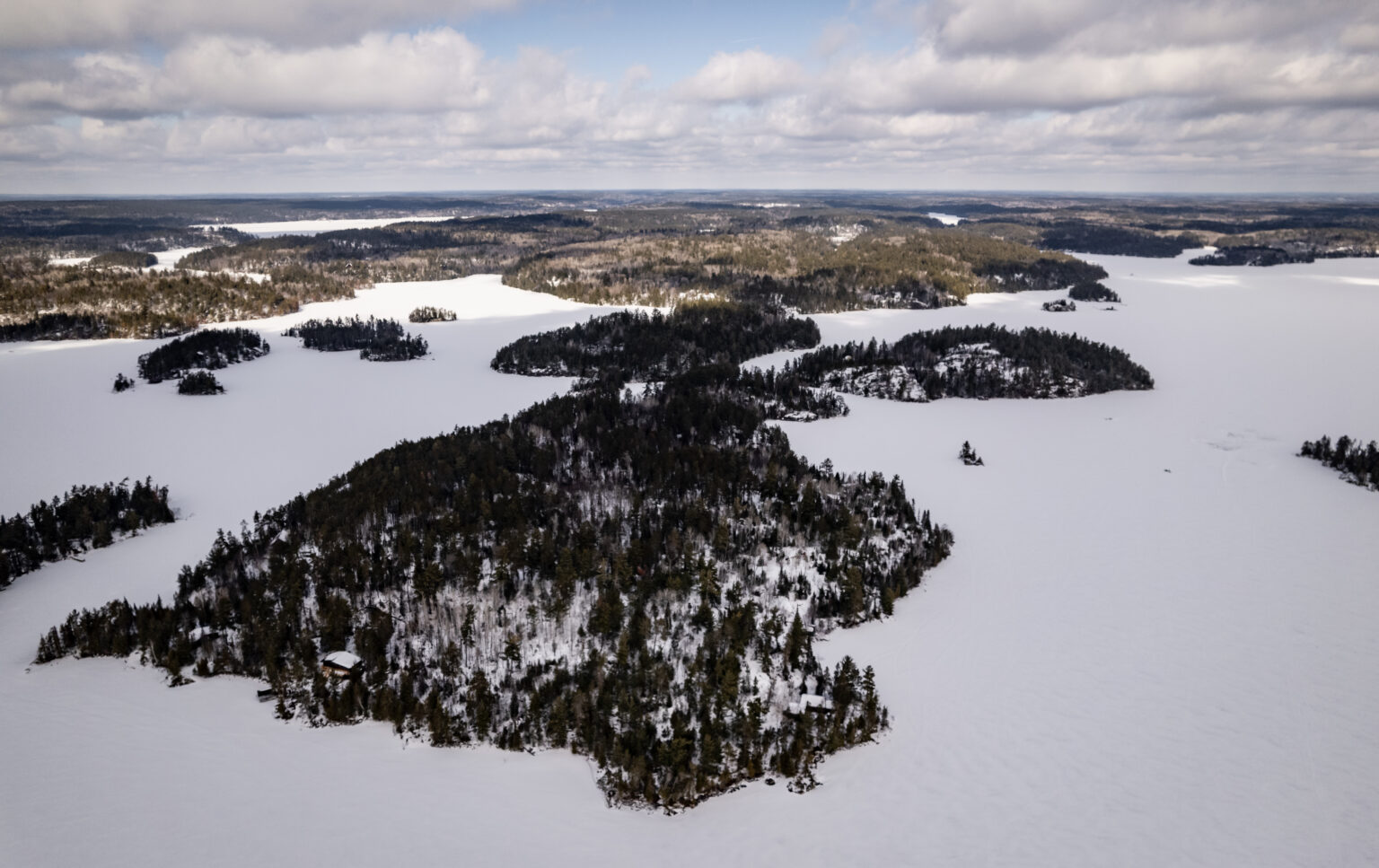Upcoming Senate Vote Could Fast Track a Banned Mine on the Edge of The Boundary Waters An aerial view of the Boundary Waters in winter.