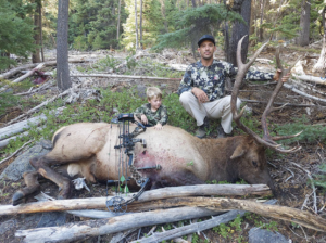 Hunters pose with an elk taken in Oregon.