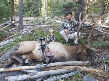 Hunters pose with an elk taken in Oregon.
