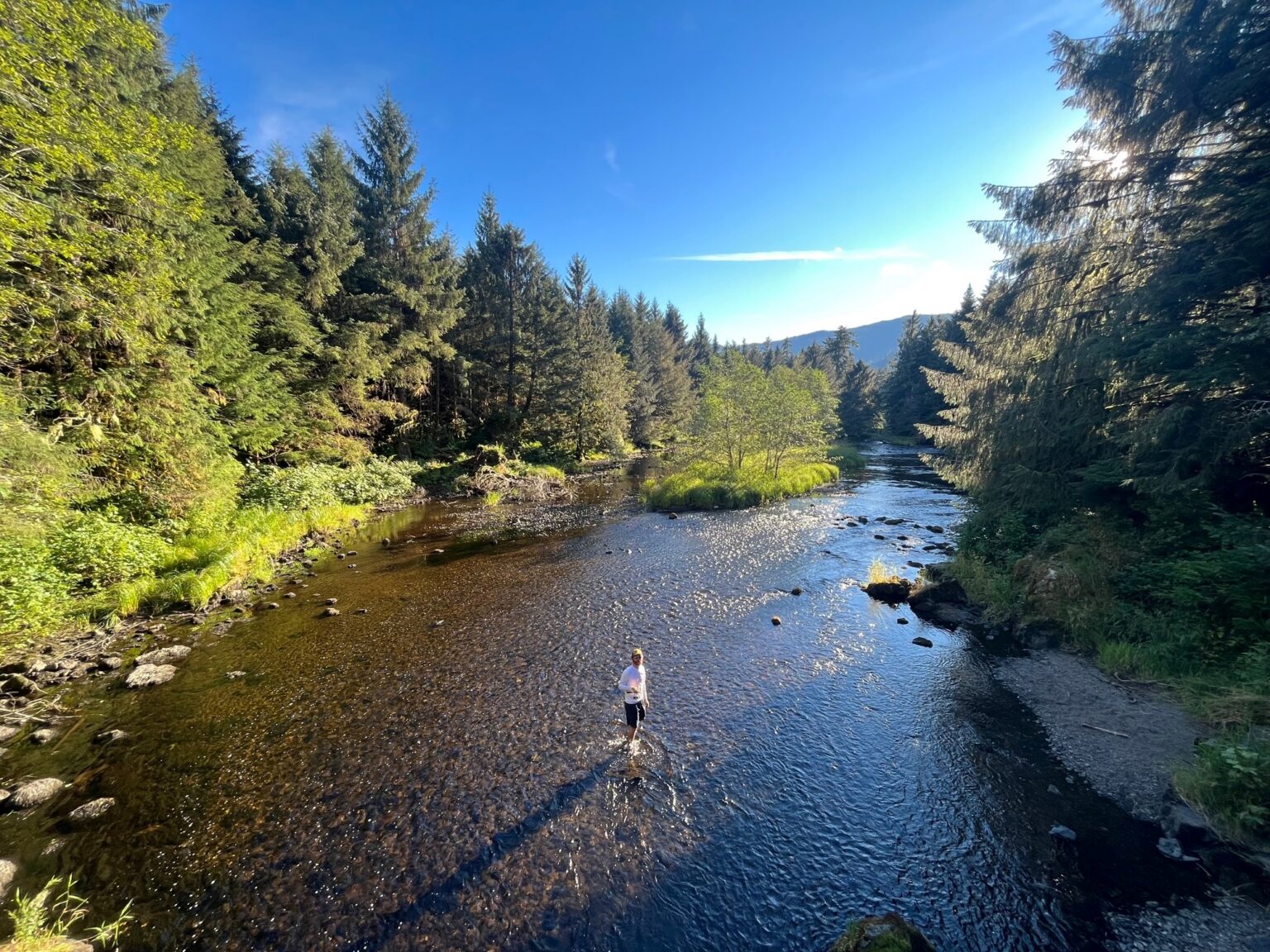 Mike Lee Amendment Would Erase Roadless Rule Protections Nationwide A man stream fishing in Alaska