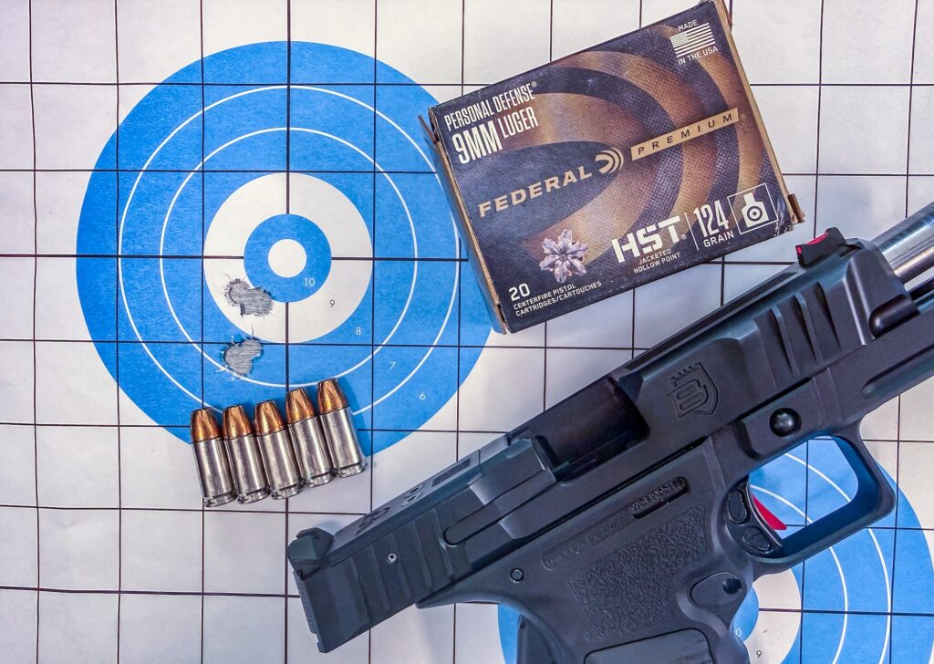 Target showing shots from the Wilson Combat Bulwark, with ammo..