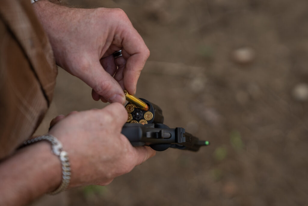 A man loads a Lipsey's revolver