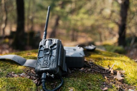 Stealth Cam Deceptor Max 3.0 Cellular Trail Camera Review—Expert Tested Stealth Cam Deceptor Max 3 cellular trail camera on a mossy rock