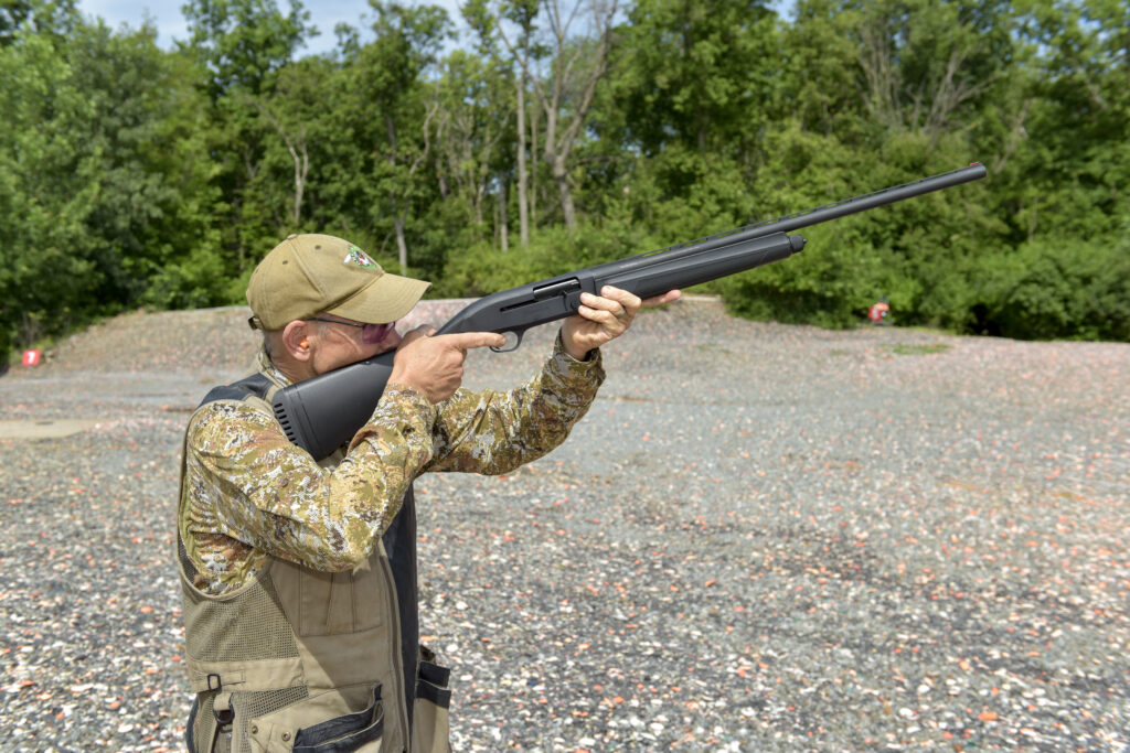 Phil Bourjaily mounts a Mossberg Maverick SA All-Purpose shotgun