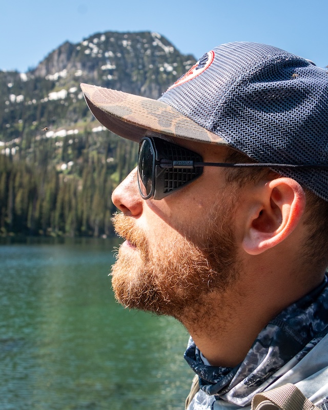 Angler wearing Ombraz armless sunglasses