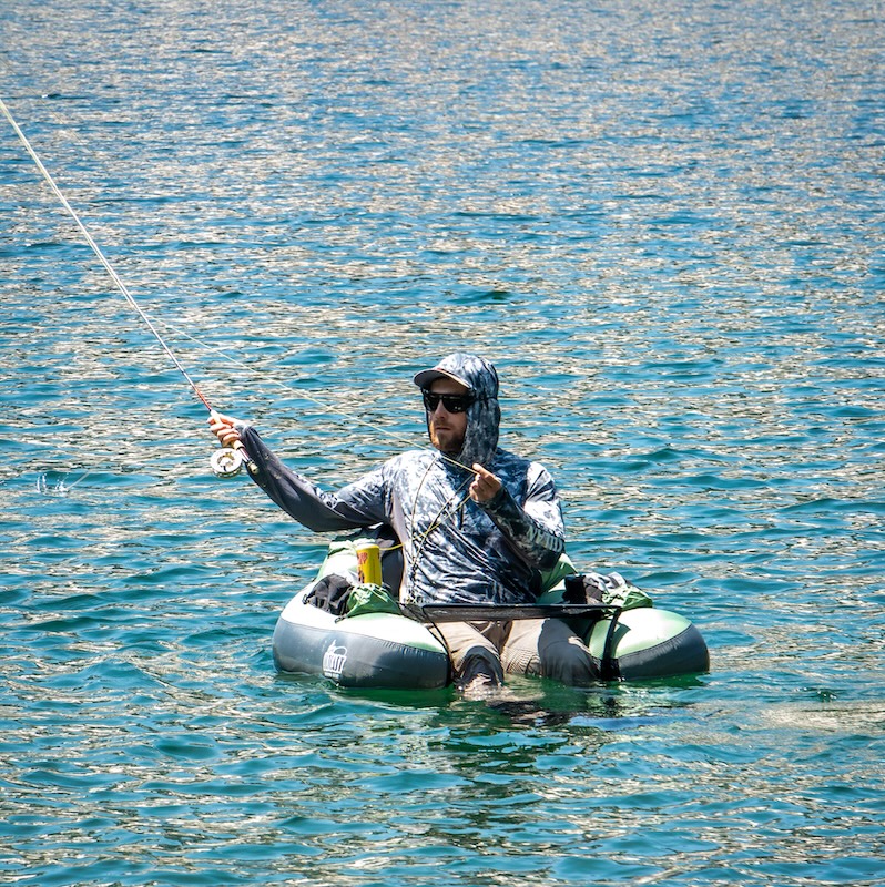Angler fishing from Outcast Summit Float Tube on lake