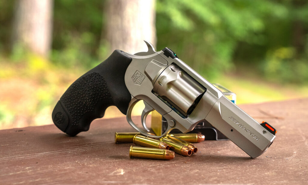 Diamondback SDR Revolver Review—Expert TestedHandgun Review Diamondback SDR Revolver resting on a bench with ammo.