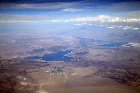 Trump Administration Green Lights First-Ever Public Land Data Center in Nevada An aerial view of Boulder City Nevada and Lake Mead.