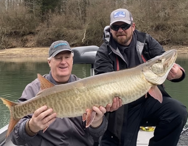 Fisherman and guide with a big musky