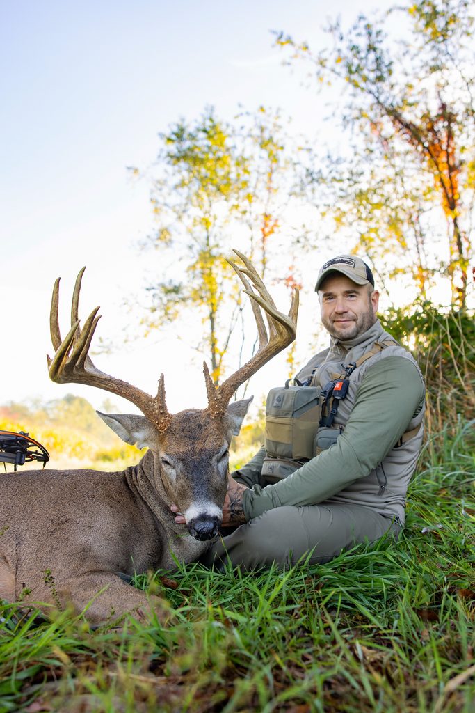 A bowhunter poses with a 200-inch whitetail buck taken in Ohio.