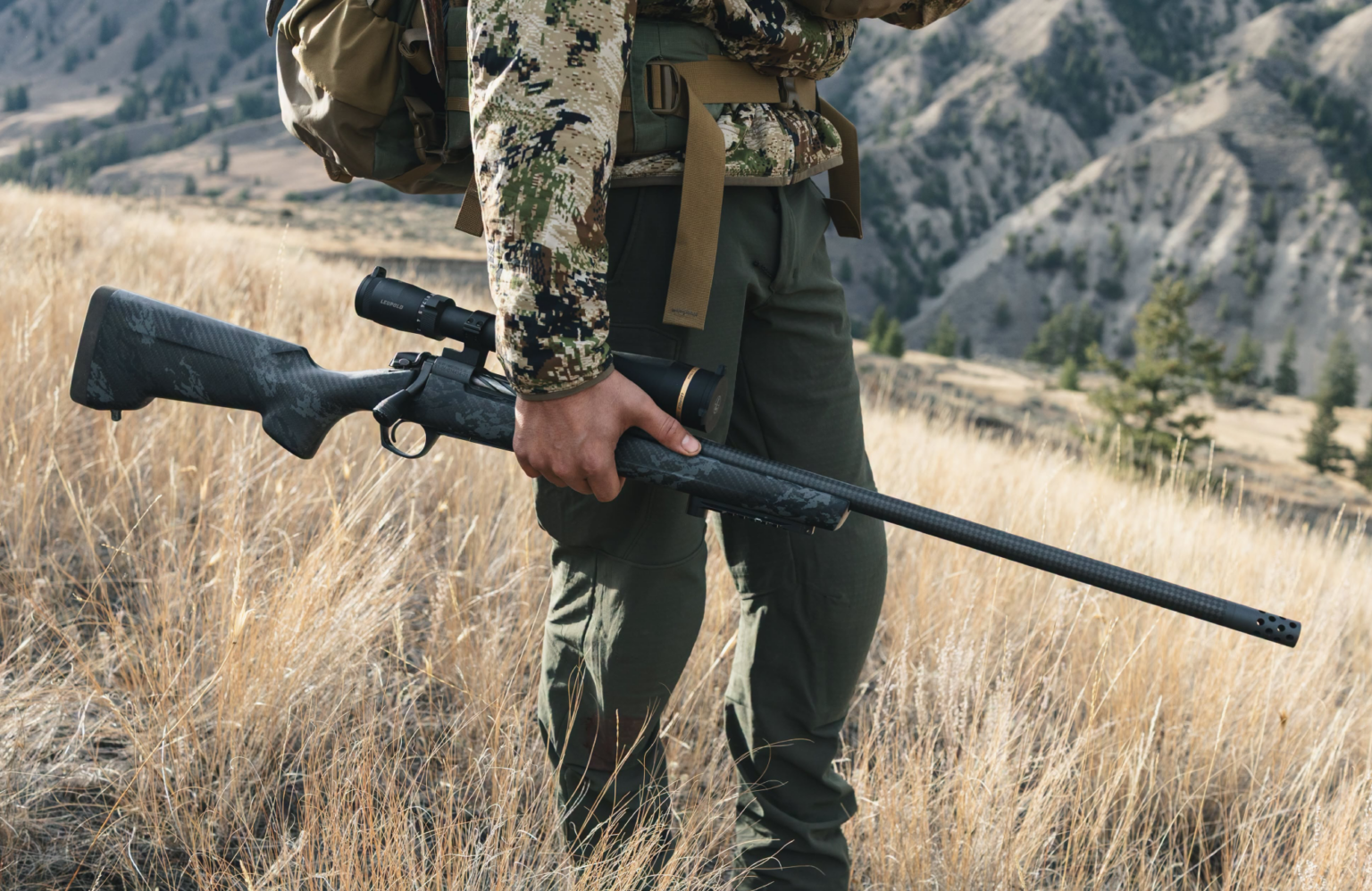 Hunter holding Bergara rifle