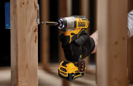 Man using Dewalt Cordless Impact Driver on home DIY project