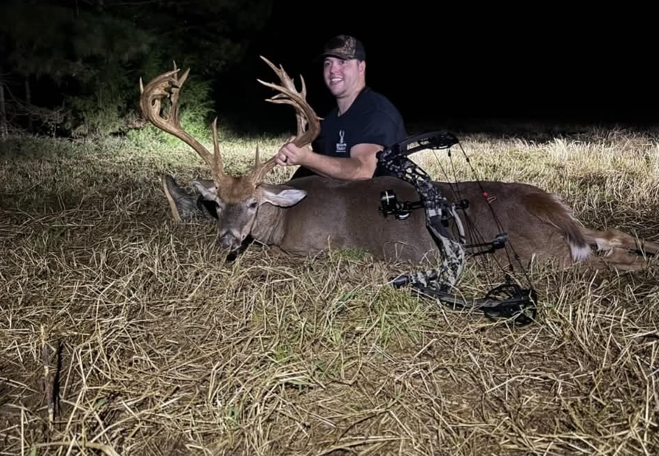 A North Carolina hunter poses with a trophy whitetail.