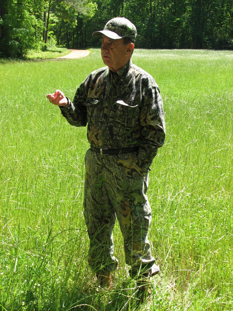 Tom Kelly gives turkey hunting instructions at a lodge in Alabama.