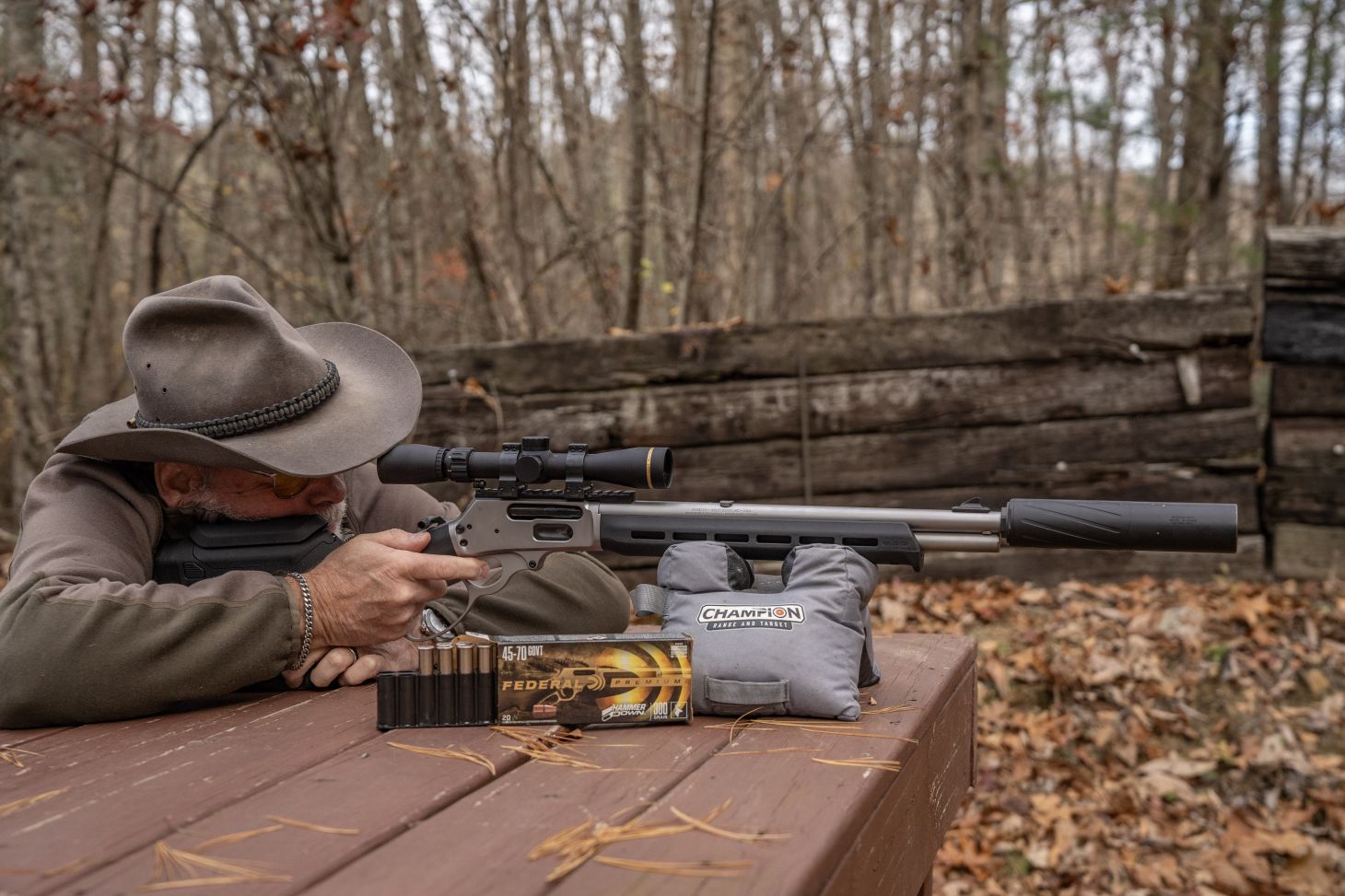 A shooter fires the new Marlin 1895 Trapper Magpul from a bench rest. 