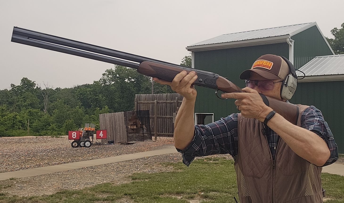 A shooter fires the new Beretta Ultraleggero Kick-Off on a skeet range. 