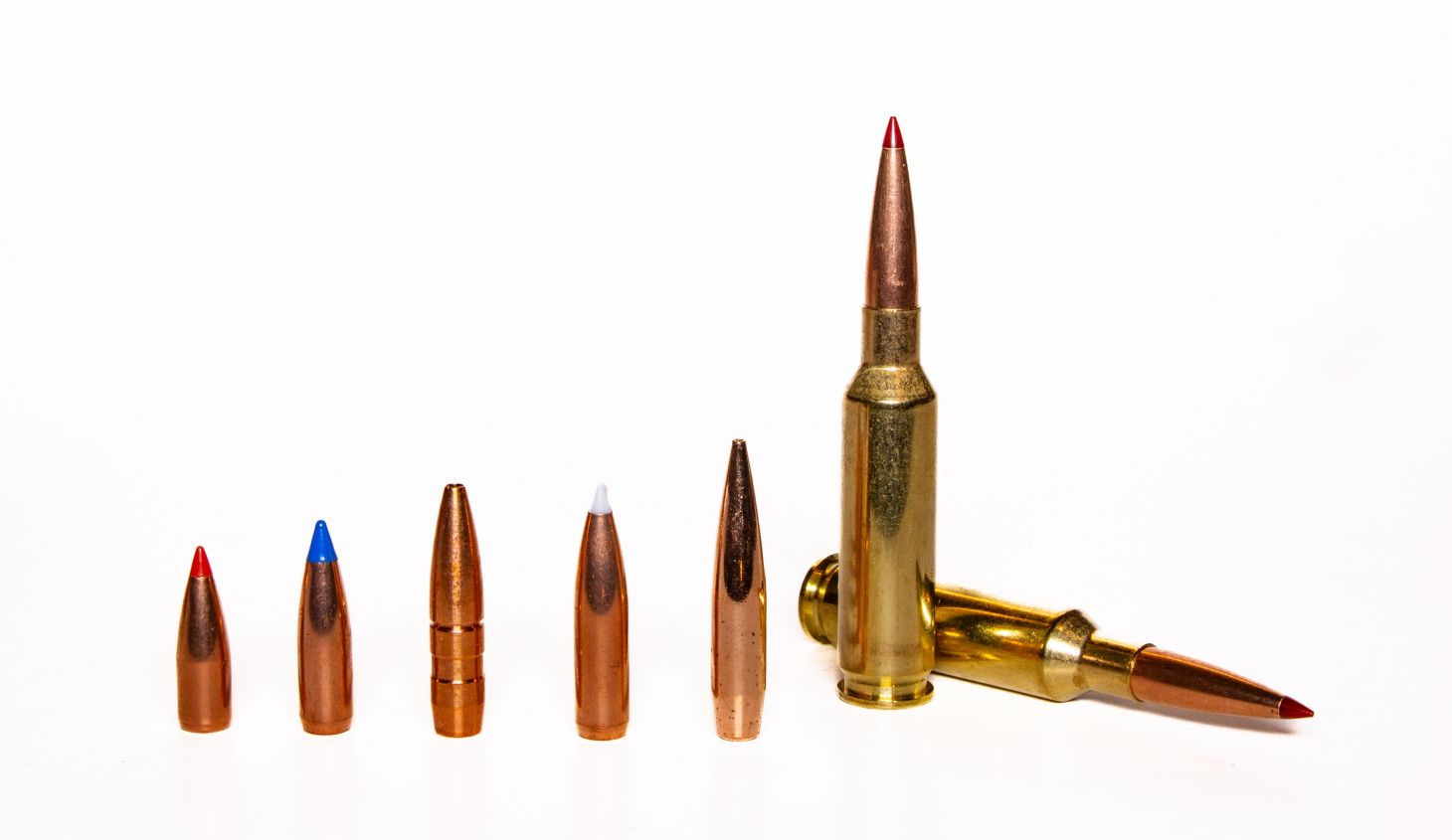 The 25 Creedmoor with different bullet weighs on a white background. 