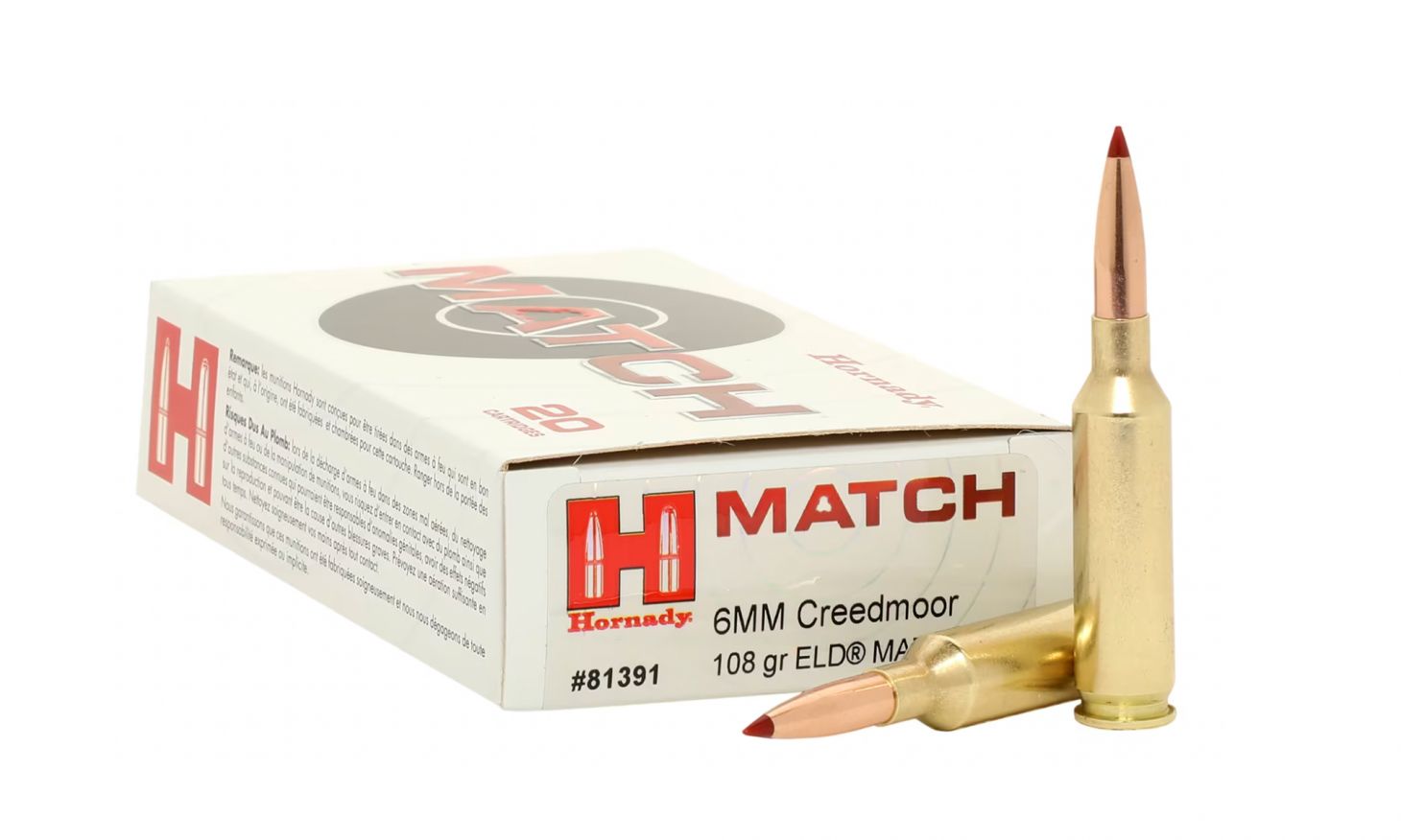 6mm Creedmoor ammo on a white background.