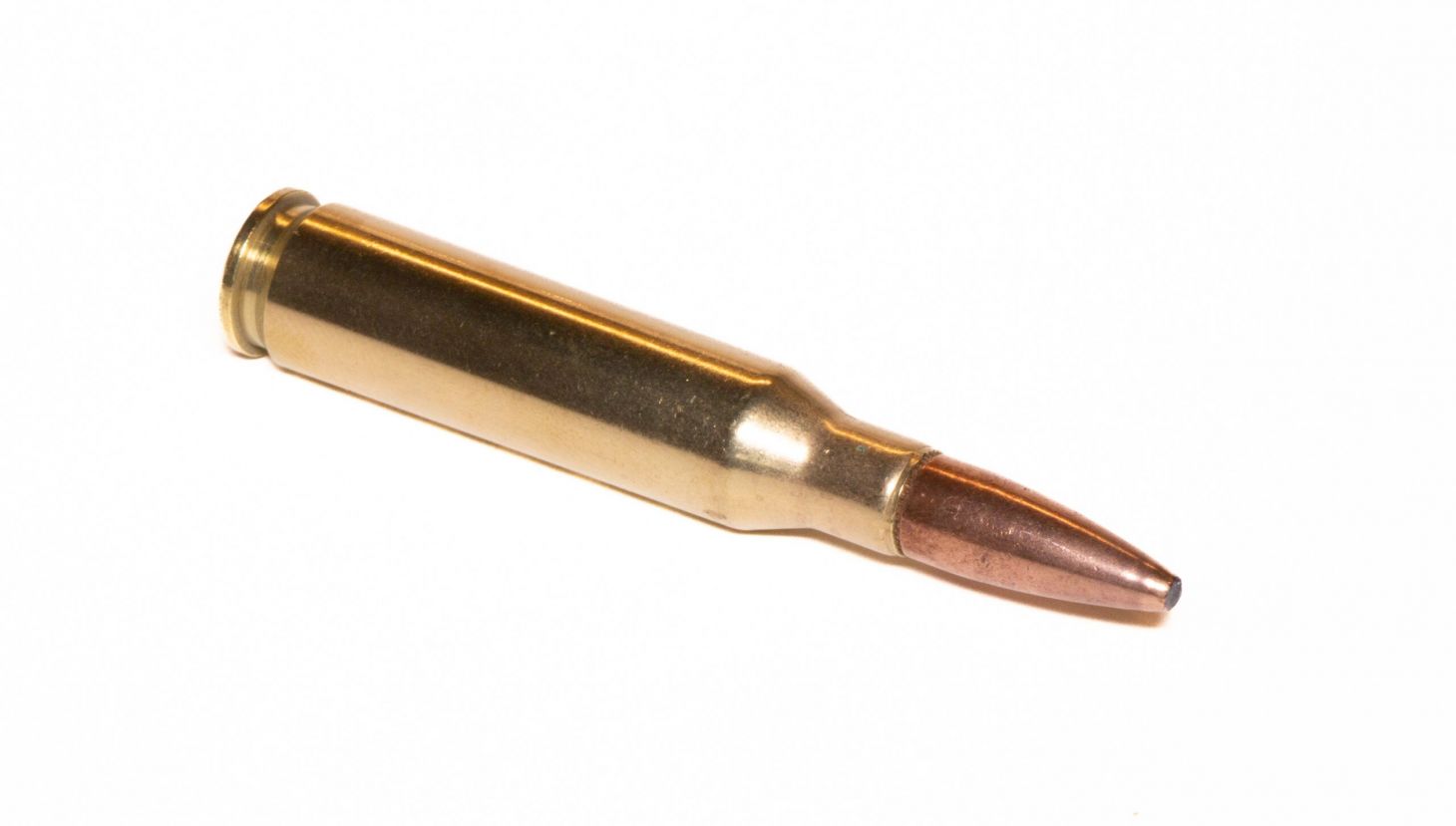 Photo of a 7mm 08 Remington cartridge on white background.
