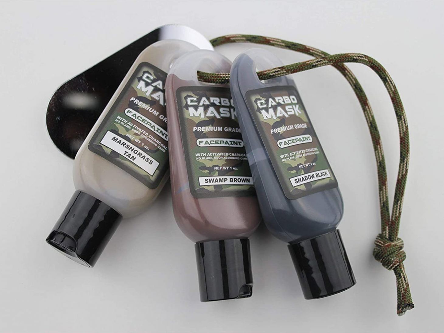 Bottles of face paint on a string.