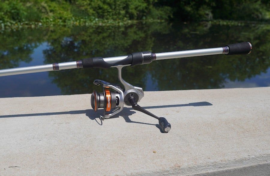 Abu Garcia Revos Spinning Combo sitting on boat